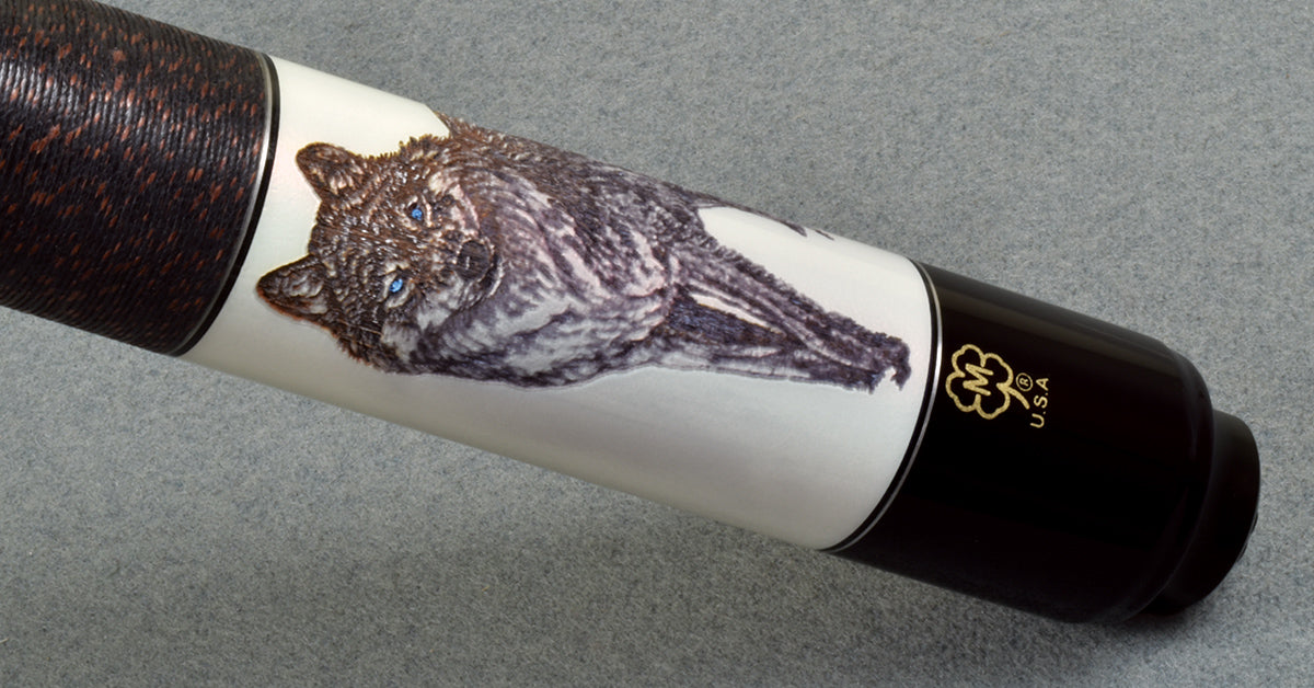 McDermott Wolf G422-G03 pool cue butt sleeve closeup showing the hand-etched wolf scrimshaw