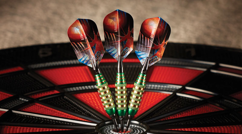 red darts and dart board 