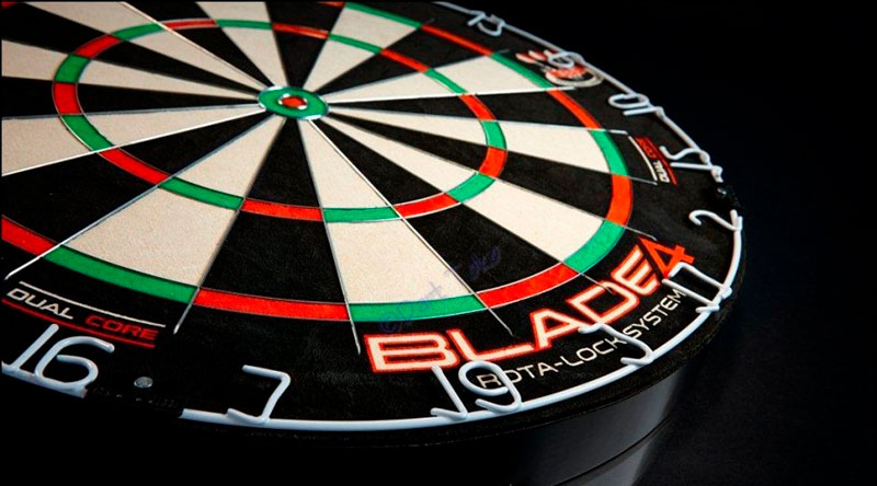 red, green, and black dart board for sale